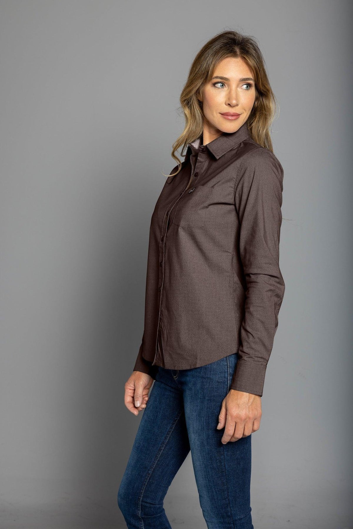 Kimes Ranch Ladies Linville top in Tobacco, side view, with a collar, long sleeves, and a front pocket