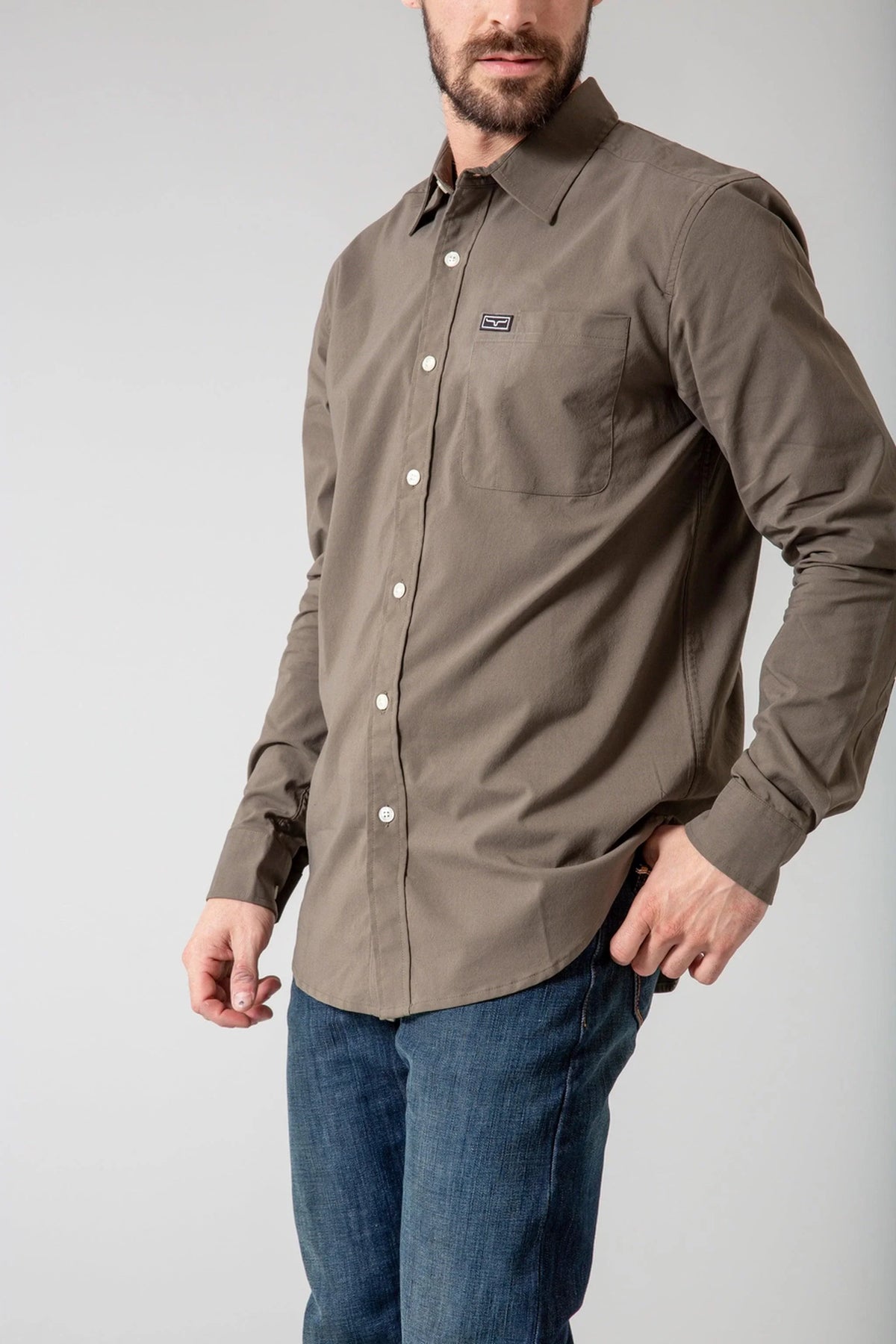 Kimes Ranch Linville Long Sleeve Dress Shirt in Army with a button-down collar and chest pocket with logo