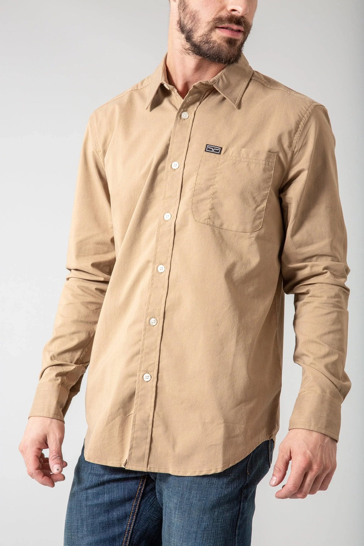 Kimes Ranch Linville Long Sleeve Dress Shirt in Tan with a button-down collar and chest pocket with logo