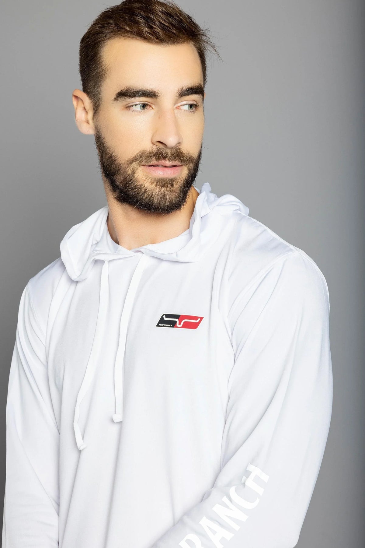 Kimes Ranch Ninja Hood Tech Tee Shirt in white with a chest logo and RANCH text on the sleeve