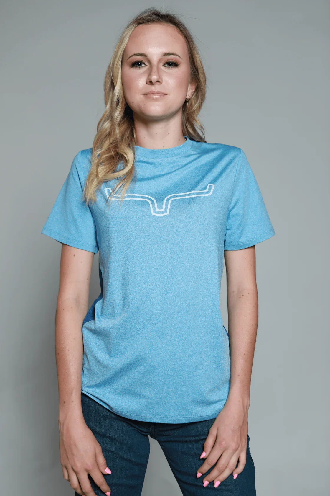 Kimes Ranch Ladies Outlier Tech Tee Shirt in Light Blue with a white outline steer logo on the chest
