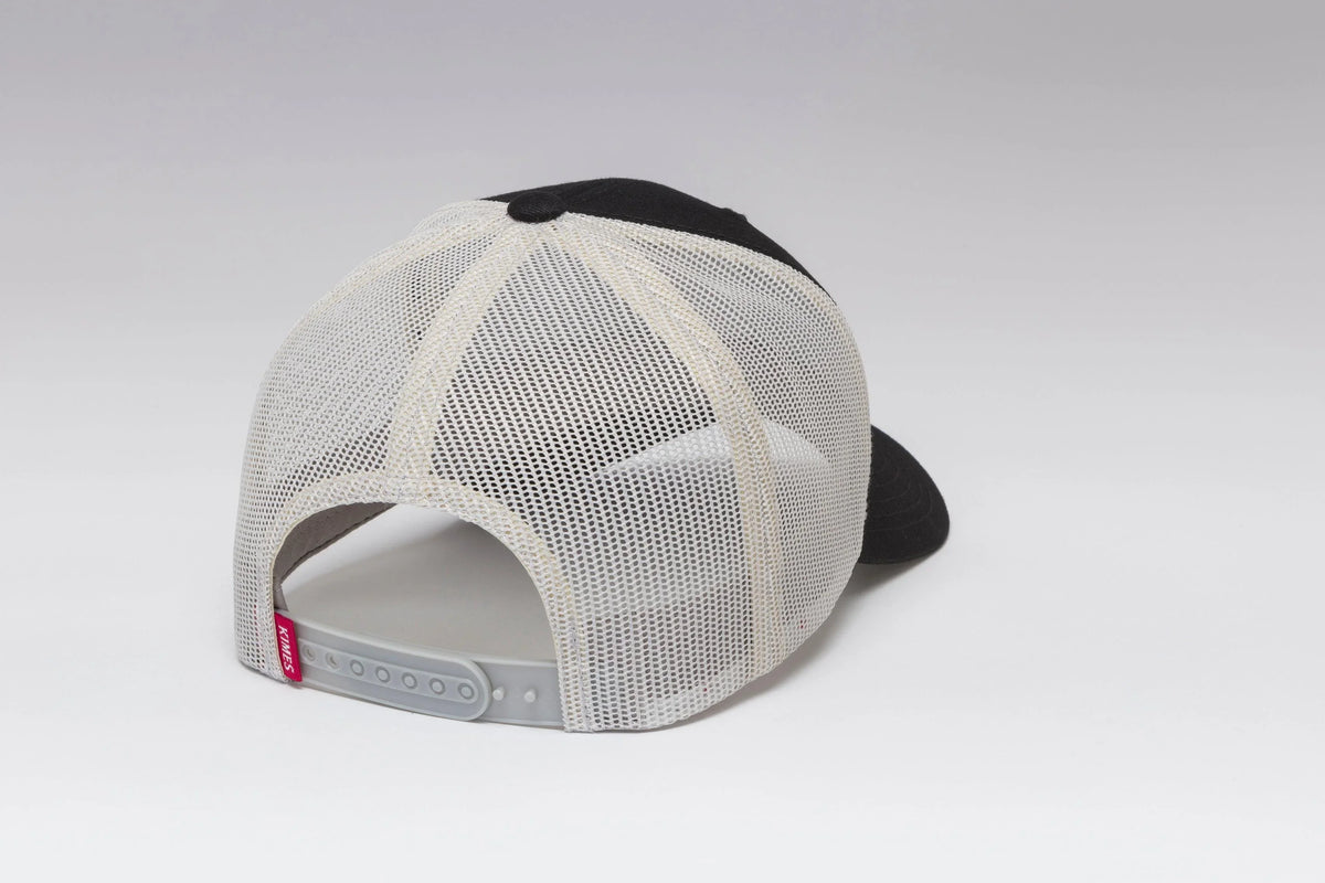 Kimes Ranch Shielded Trucker Hat in Black, back view, with white mesh back and adjustable strap