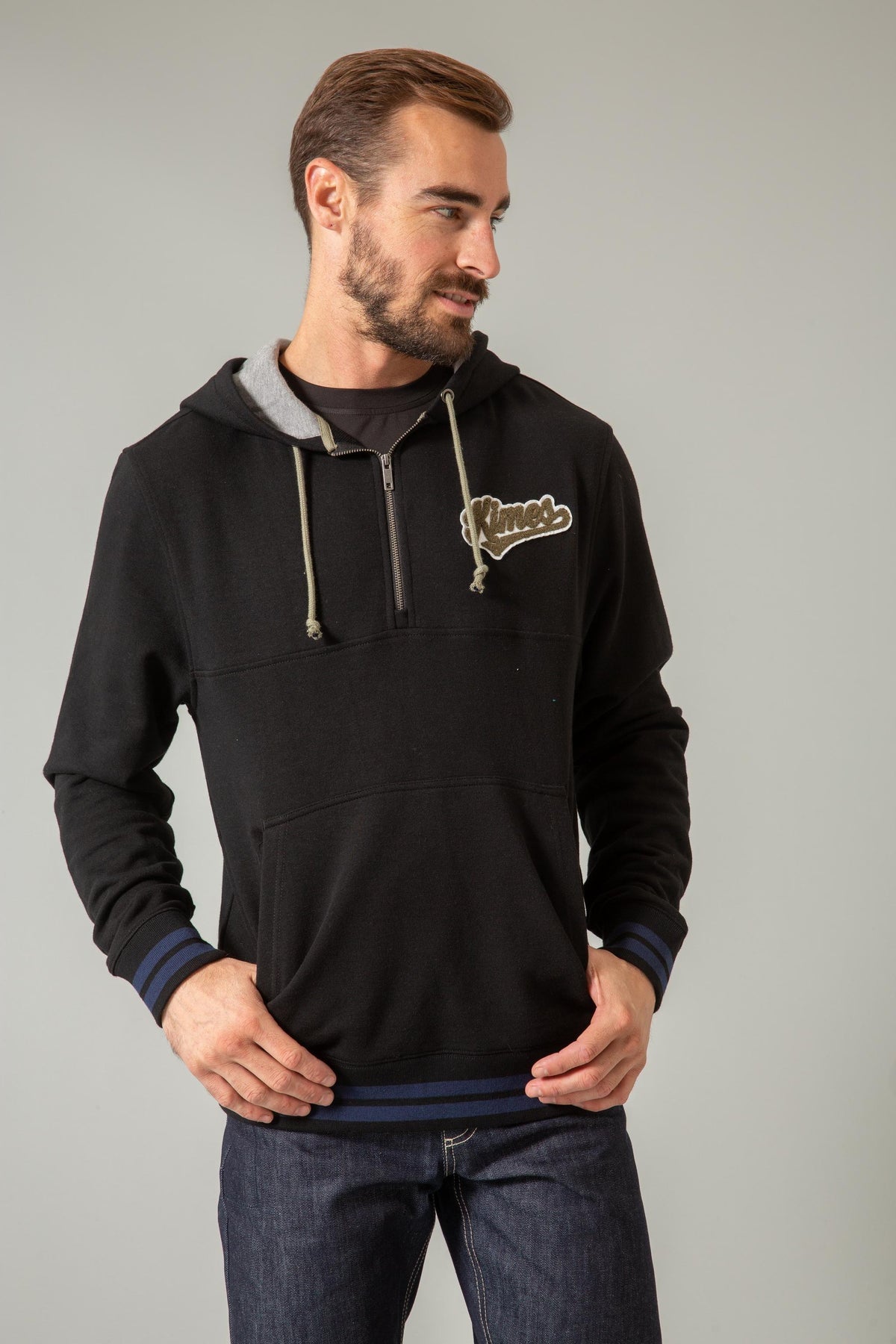 Kimes Ranch Team One Hoodie in Black with a half-zip front, kangaroo pocket, and embroidered Kimes Ranch logo